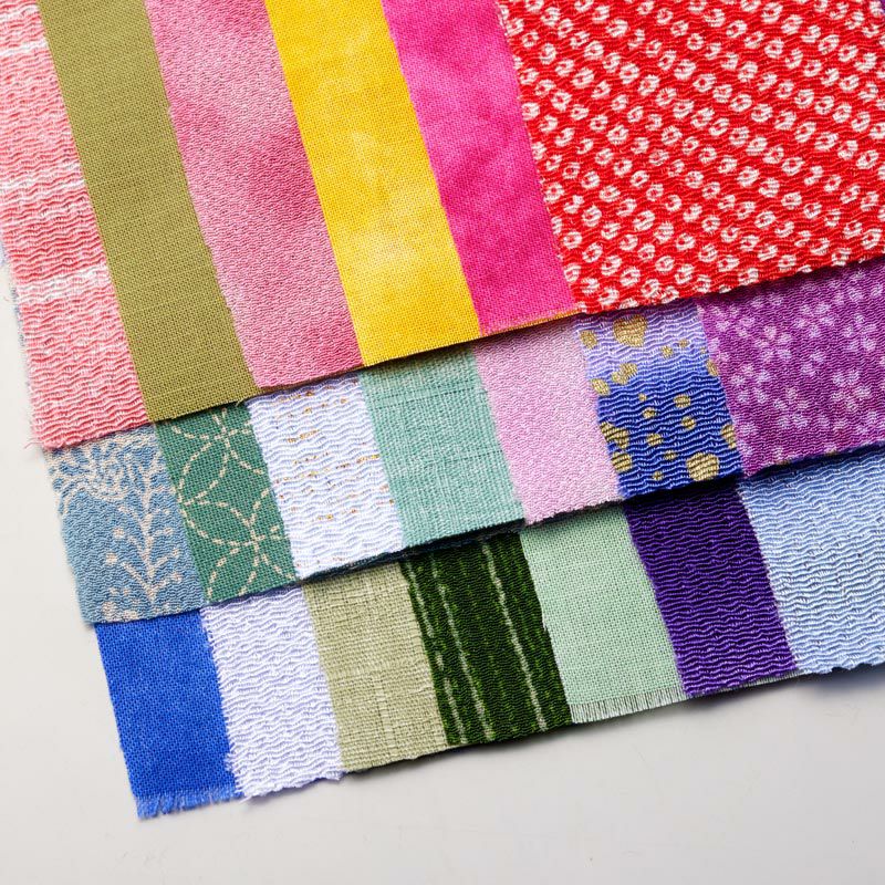 上質な国産ちりめん布やコットン布など多彩な布を22枚使用